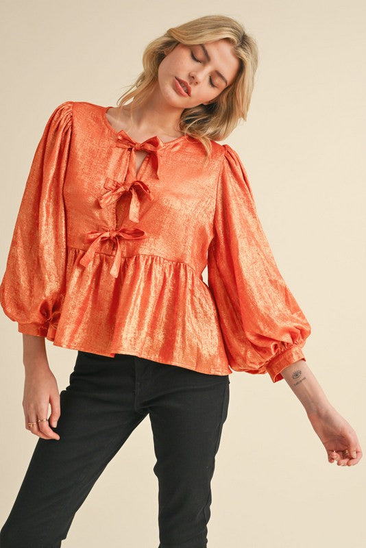 Orange / Metallic Peplum Top w/Bows