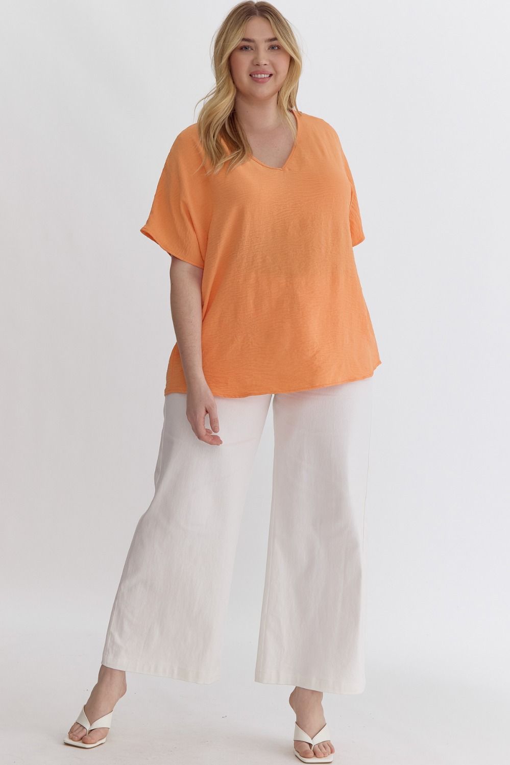 Solid V-Neck Asymmetric Round Hem